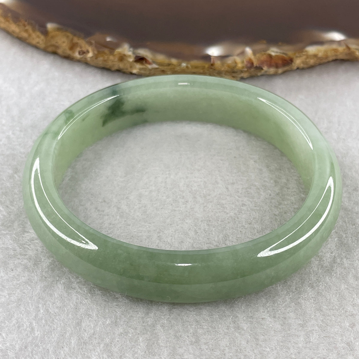 Certified Natural Type A Jelly Green Jadeite Oval Bangle | (43.99g | 55.1mm Inner Diameter | 12.5mm x 7.0mm | Close to Perfect | Radiance, Steady Wealth "Zheng Cai" Anchor & Feng Shui Prosperity Catalyst) - Huangs Jadeite and Jewelry Pte Ltd