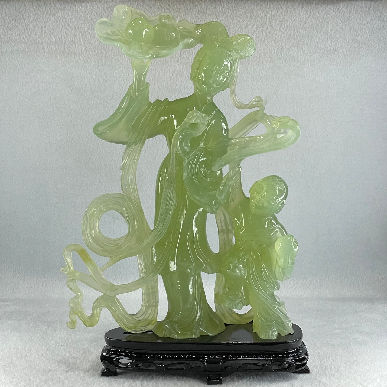 Natural Semi Icy Green Serpentine Fairy with Tong Zhi and Lotus Flower with Wooden Stand Display 1,228.0g 196.0 by 76.0 by 283.0mm - Huangs Jadeite and Jewelry Pte Ltd