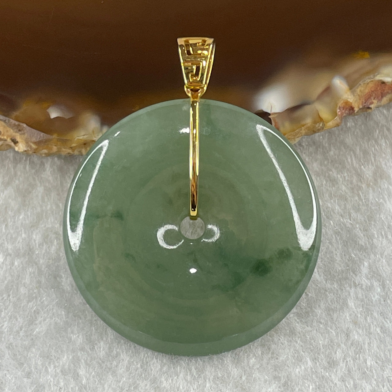 Type A Natural Semi Icy Green with Green Piao Hua Jadeite Ping An Kou Pendant with 18K Yellow Gold Clap 10.67g 30.5 by 5.2mm - Huangs Jadeite and Jewelry Pte Ltd