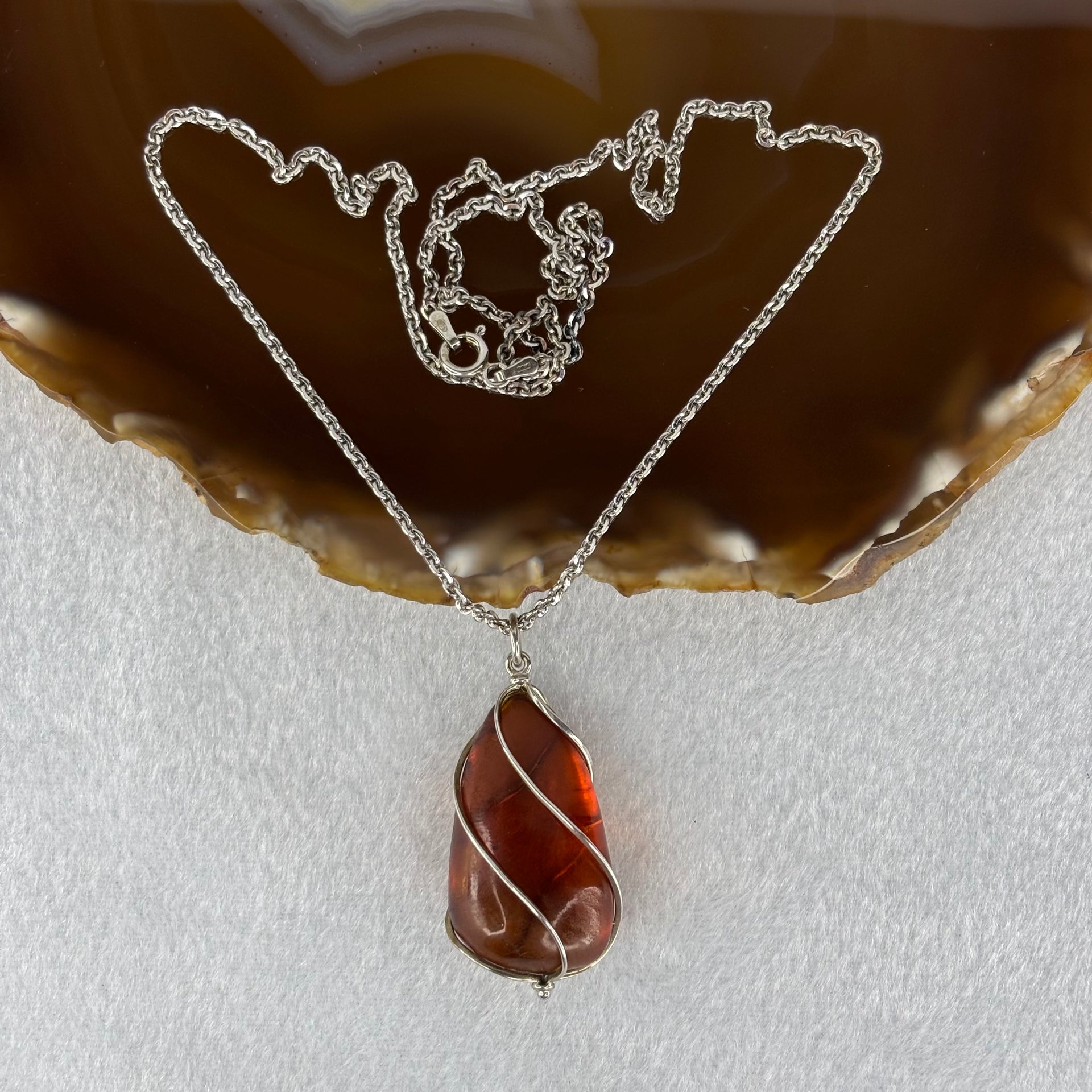 Natural Amber in S925 Sliver Necklace 11.95g 33.5 by 19.4 by 14.5mm - Huangs Jadeite and Jewelry Pte Ltd