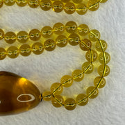 Natural Yellow Amber Foot Pendent 32.5 by 24.2 by 19.5mm with Yellow Amber Beads Necklace 6.9mm 104 Beads Total 22.56g - Huangs Jadeite and Jewelry Pte Ltd