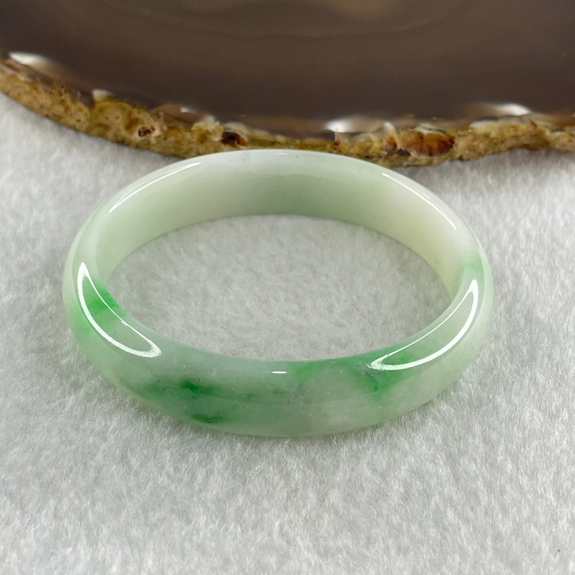Type A Natural Light Green Faint Lavender with Emerald Green Patches Jadeite Oval Bangle 31.66g Inner Diameter 53.4mm 12.2 by 5.7mm (Internal Lines) - Huangs Jadeite and Jewelry Pte Ltd