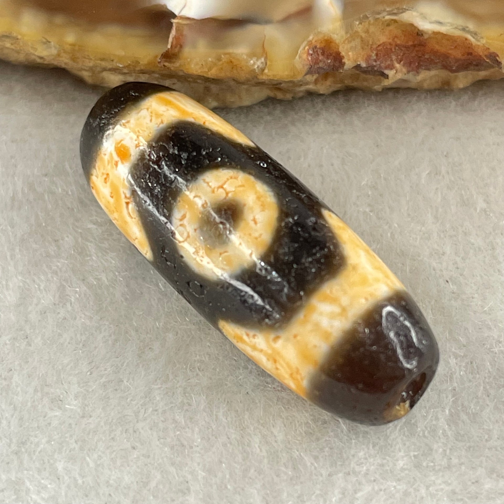 Natural Powerful Tibetan Old Oily Agate 3 Eyes Dzi Bead Heavenly Master (Tian Zhu) 三眼天诛 4.57g 28.2 by 10.4mm - Huangs Jadeite and Jewelry Pte Ltd