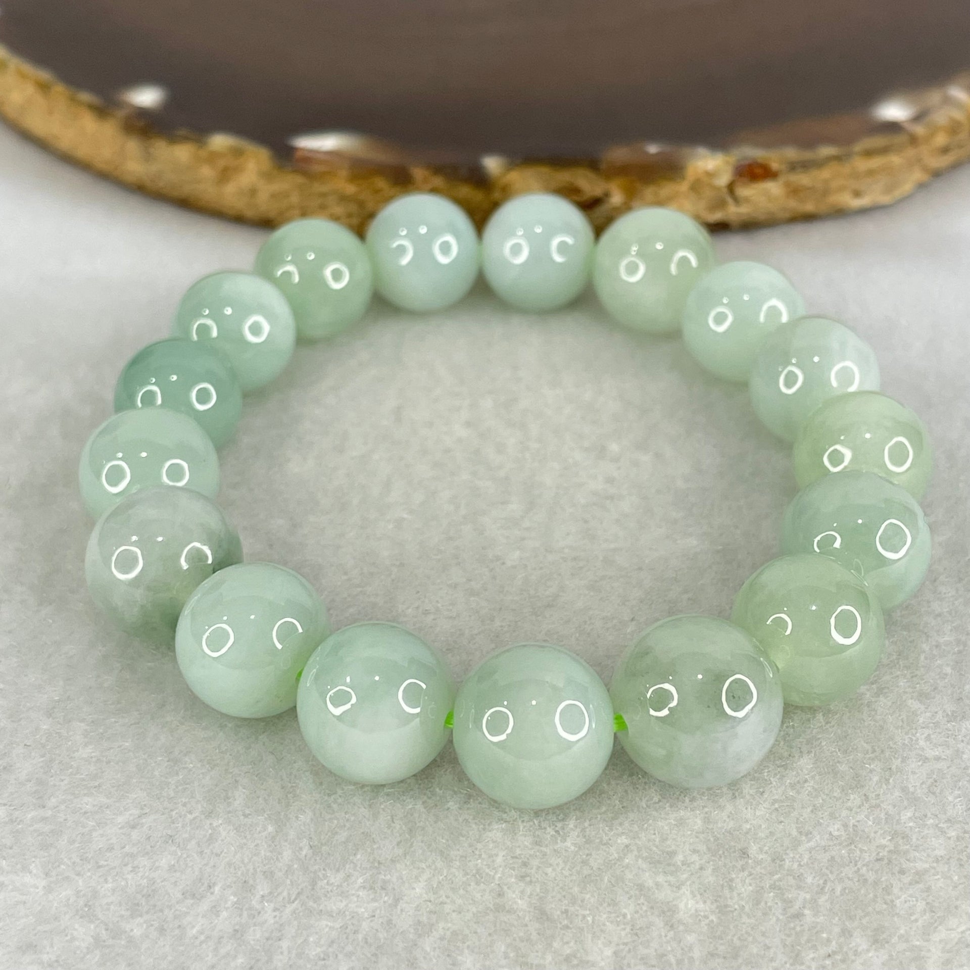 Type A Light Green and Blueish Green Patch Jadeite Beads Bracelet 44.03g 16.5cm by 12.0mm 17 Beads - Huangs Jadeite and Jewelry Pte Ltd