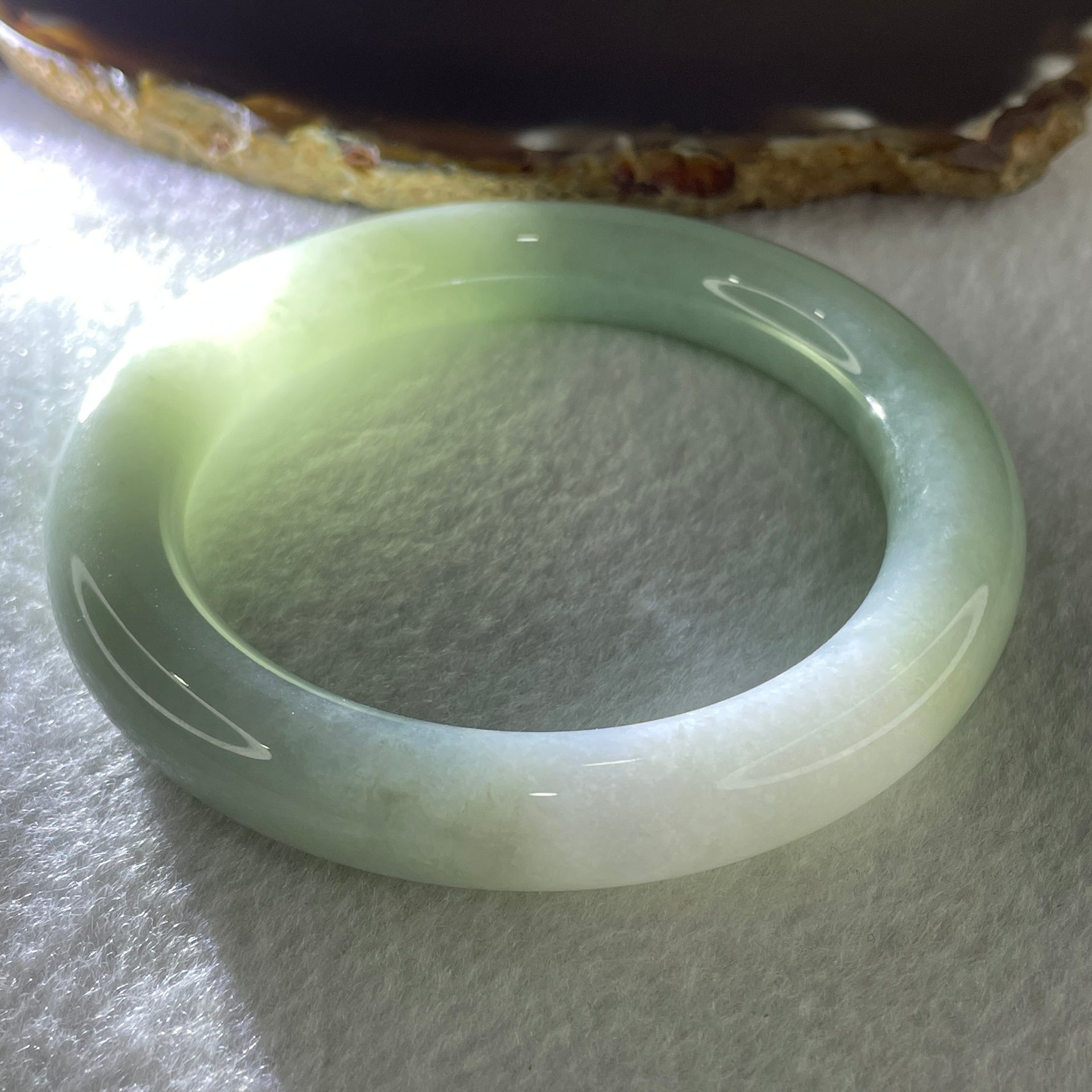 Type A Natural Jelly Light Green with Faint Lavender Jadeite Bangle 74.36g Inner Diameter 59.2mm 11.3 by 11.9mm (Close to Perfect) - Huangs Jadeite and Jewelry Pte Ltd