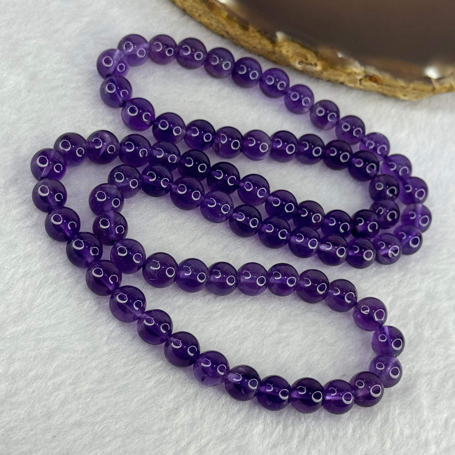 Good Grade Natural Amethyst Necklace 46.64g 53cm 7.8mm 75 Beads - Huangs Jadeite and Jewelry Pte Ltd