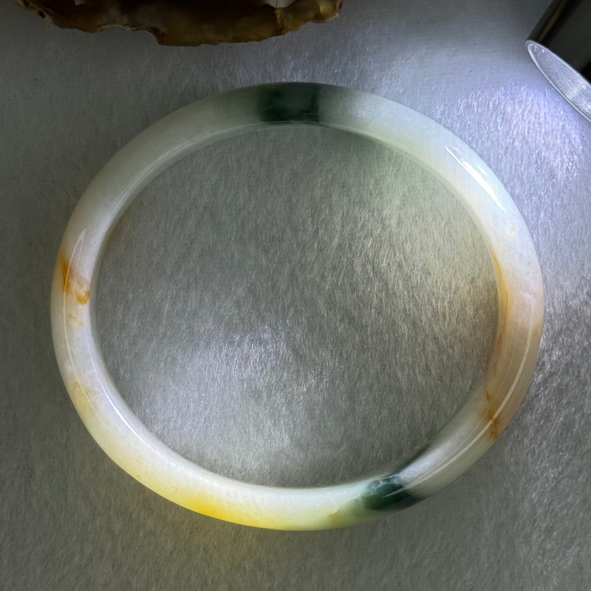 Type A Light Green with Blueish Green and Yellow Jadeite Oval Bangle Internal Diameter 55.8mm 36.00g 12.4 by 5.7mm (Slight Difference External Line) - Huangs Jadeite and Jewelry Pte Ltd