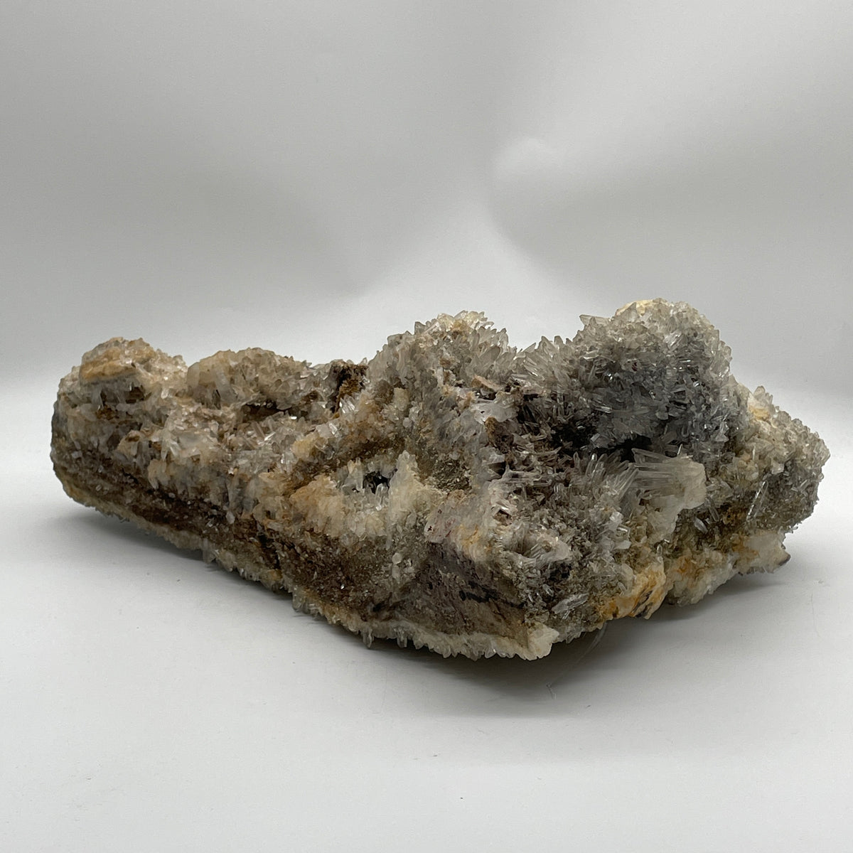 Natural Clear Quartz with Greyish and Yellow Rough Mountain Shaped with Wooden Stand Display 7,790.6g 250.0 by 130.0 by 365.0mm - Huangs Jadeite and Jewelry Pte Ltd