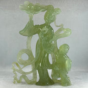 Natural Semi Icy Green Serpentine Fairy with Tong Zhi and Lotus Flower with Wooden Stand Display 1,228.0g 196.0 by 76.0 by 283.0mm - Huangs Jadeite and Jewelry Pte Ltd