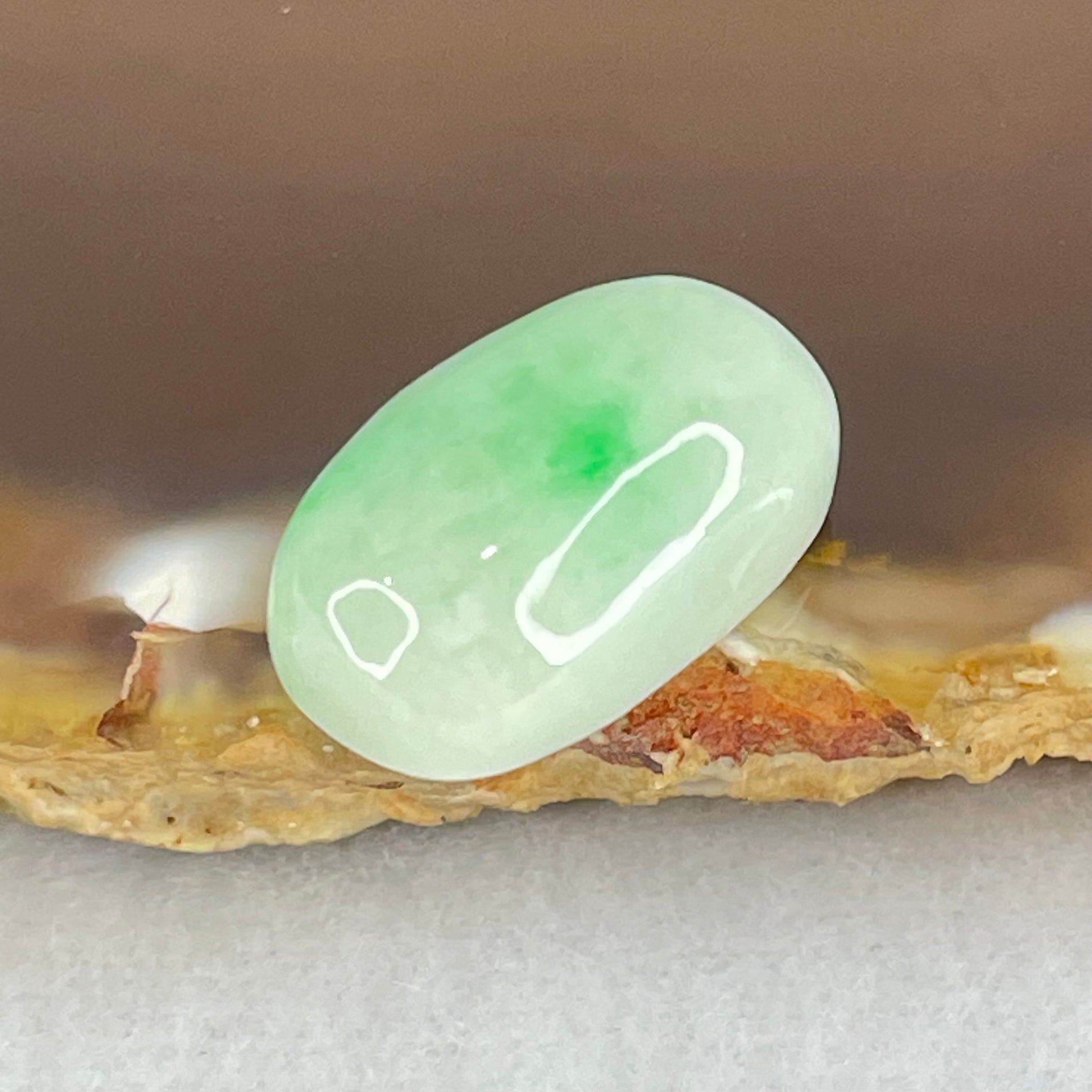 Type A Light Green with Apple Green Patches Jadeite Oval Cabouchon Stone For Setting 2.90g 17.2 by 10.2 by 7.7mm - Huangs Jadeite and Jewelry Pte Ltd