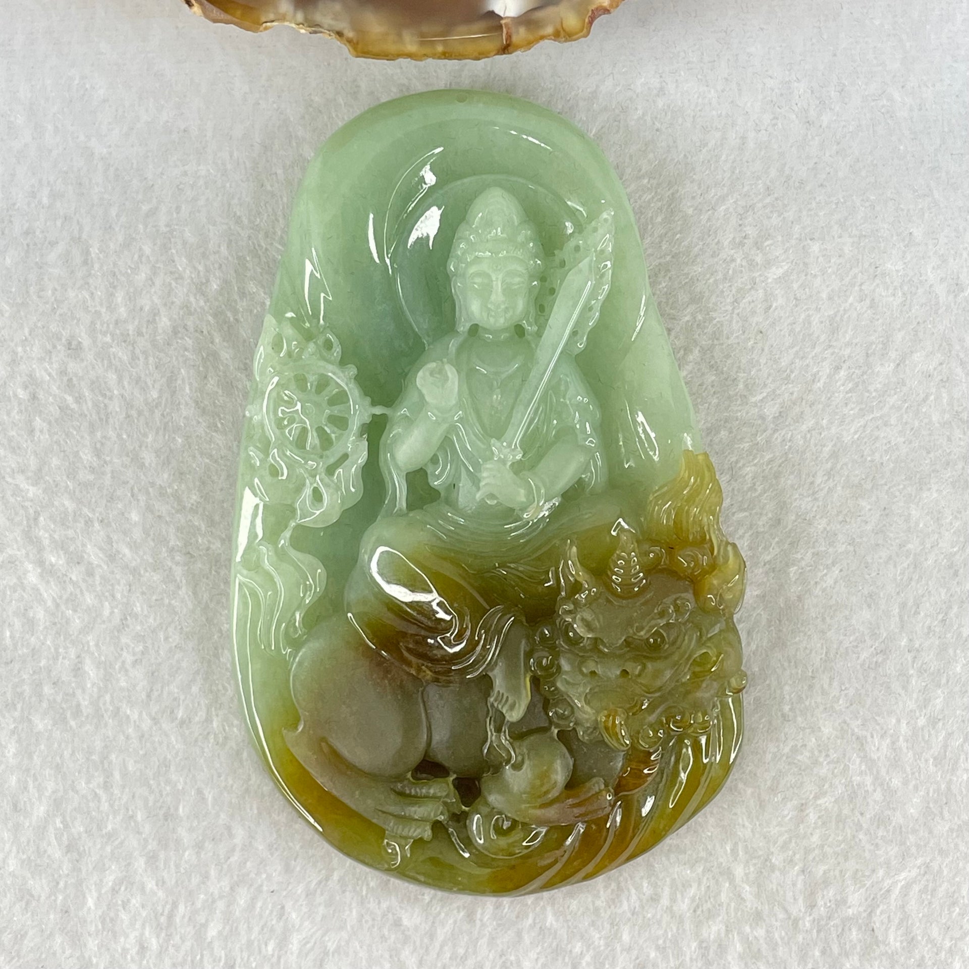 Grand Master Type A Apple Green and Brownish Jadeite Guan Yin Manjusri Bodhisattva Pendant 88.98g 82.5 by 5.3 by 14mm - Huangs Jadeite and Jewelry Pte Ltd