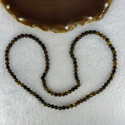 Natural Dark Brown Flower Amber Beads Elastic Necklace 8.02g 50cm 5.4mm 105 Beads - Huangs Jadeite and Jewelry Pte Ltd