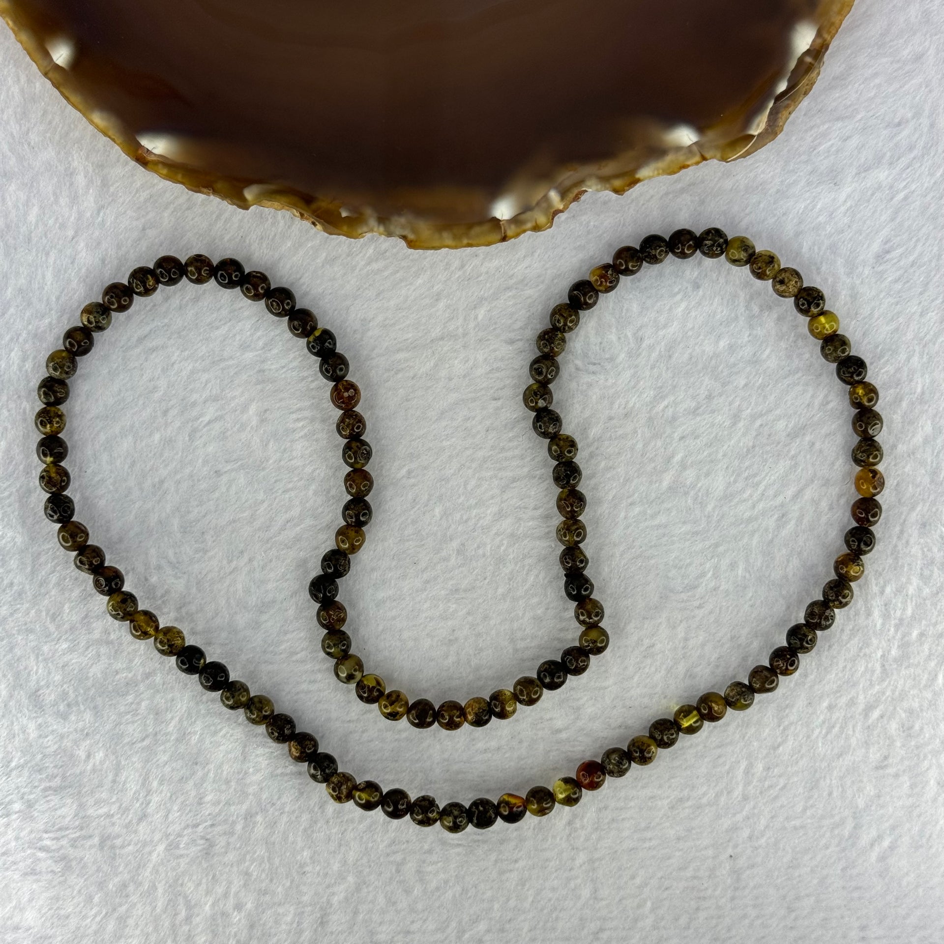 Natural Dark Brown Flower Amber Beads Elastic Necklace 8.02g 50cm 5.4mm 105 Beads - Huangs Jadeite and Jewelry Pte Ltd