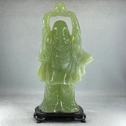 Natural Green Serpentine Stand Laughing Milo Buddha with Wealth Pot with Wooden Stand Display 1,599.3g 140.0 by 90.0 by 270.0mm - Huangs Jadeite and Jewelry Pte Ltd