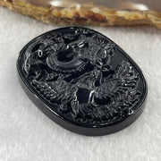 Type A Opaque to Partial Translucent Black Omphacite Jadeite Dragon and Phoenix Pendant 20.96g 50.2 by 38.3 by 8.4mm - Huangs Jadeite and Jewelry Pte Ltd