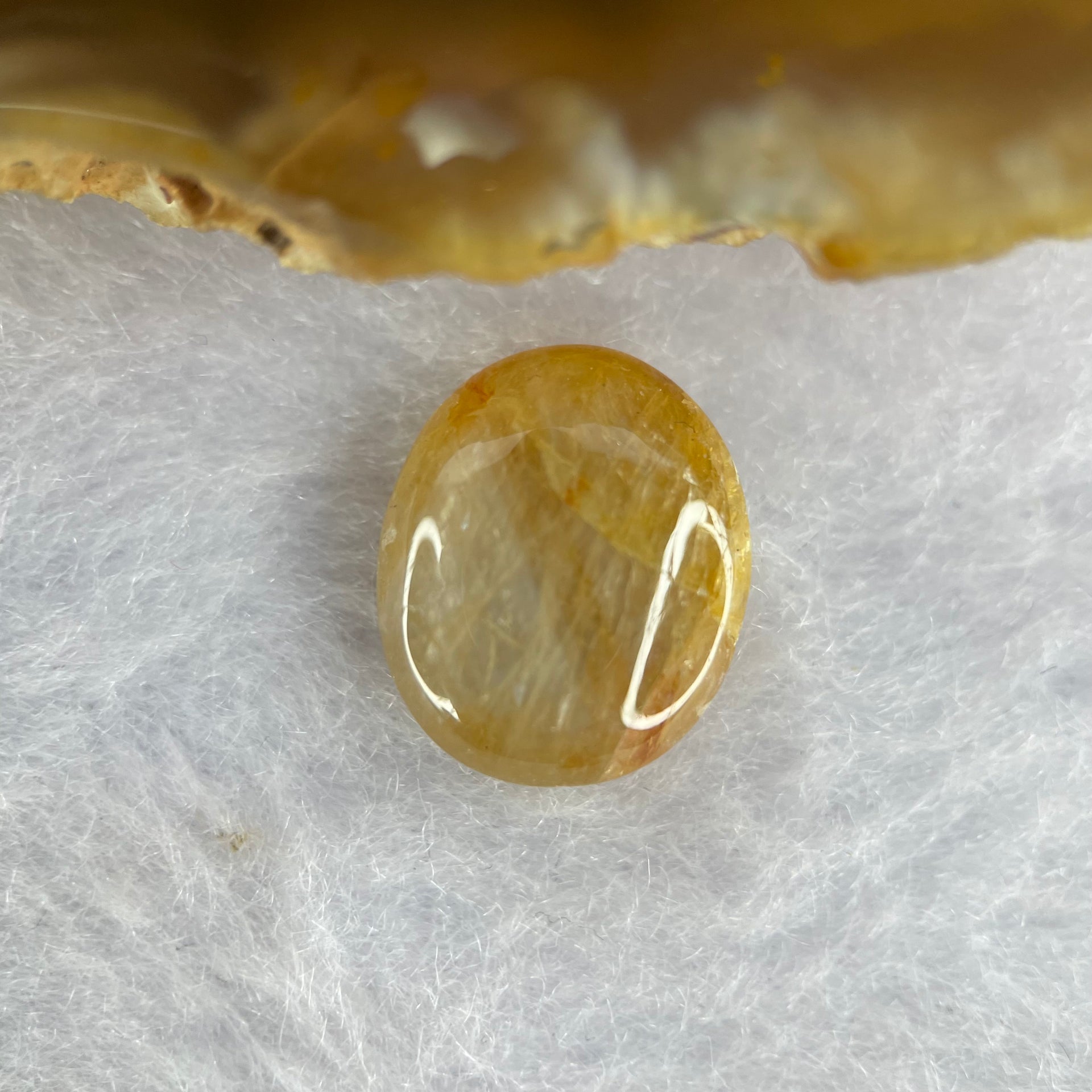 Natural Yellow Star Sapphire 11.90 ct 14.6 by 12.4 by 5.4mm - Huangs Jadeite and Jewelry Pte Ltd