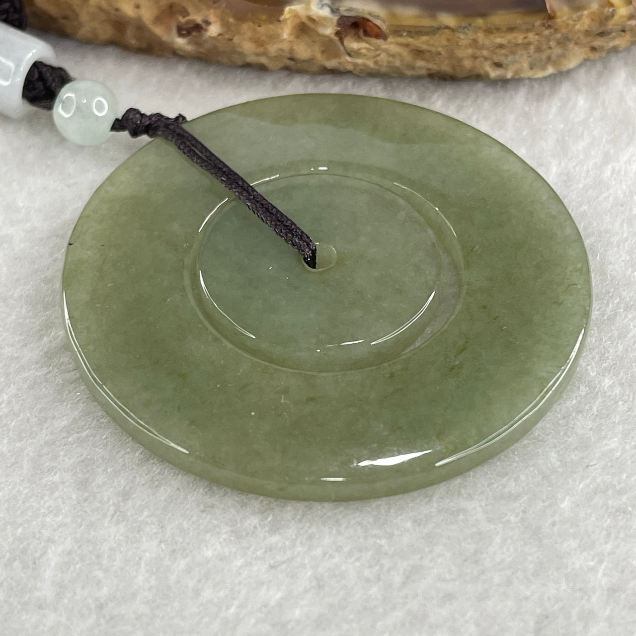 Natural Type A Green with Brownish Jadeite Double Ping An Kou Donut Pendant 20.64g 44.9 by 3.4mm - Huangs Jadeite and Jewelry Pte Ltd