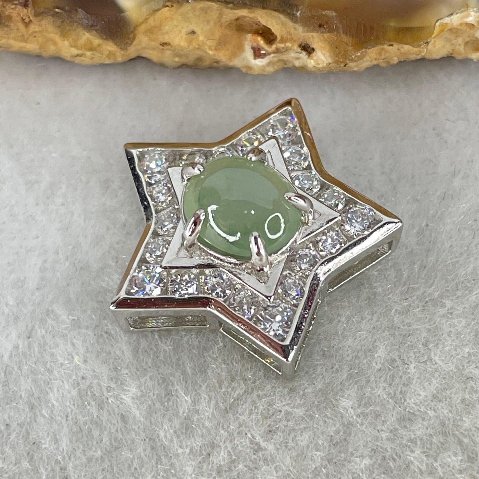 Type A Semi Icy Blueish Green Cabochon Jadeite in S925 Sliver Star with Crystal Charm 2.36g 7.4 by 6.5 by 3.0mm - Huangs Jadeite and Jewelry Pte Ltd