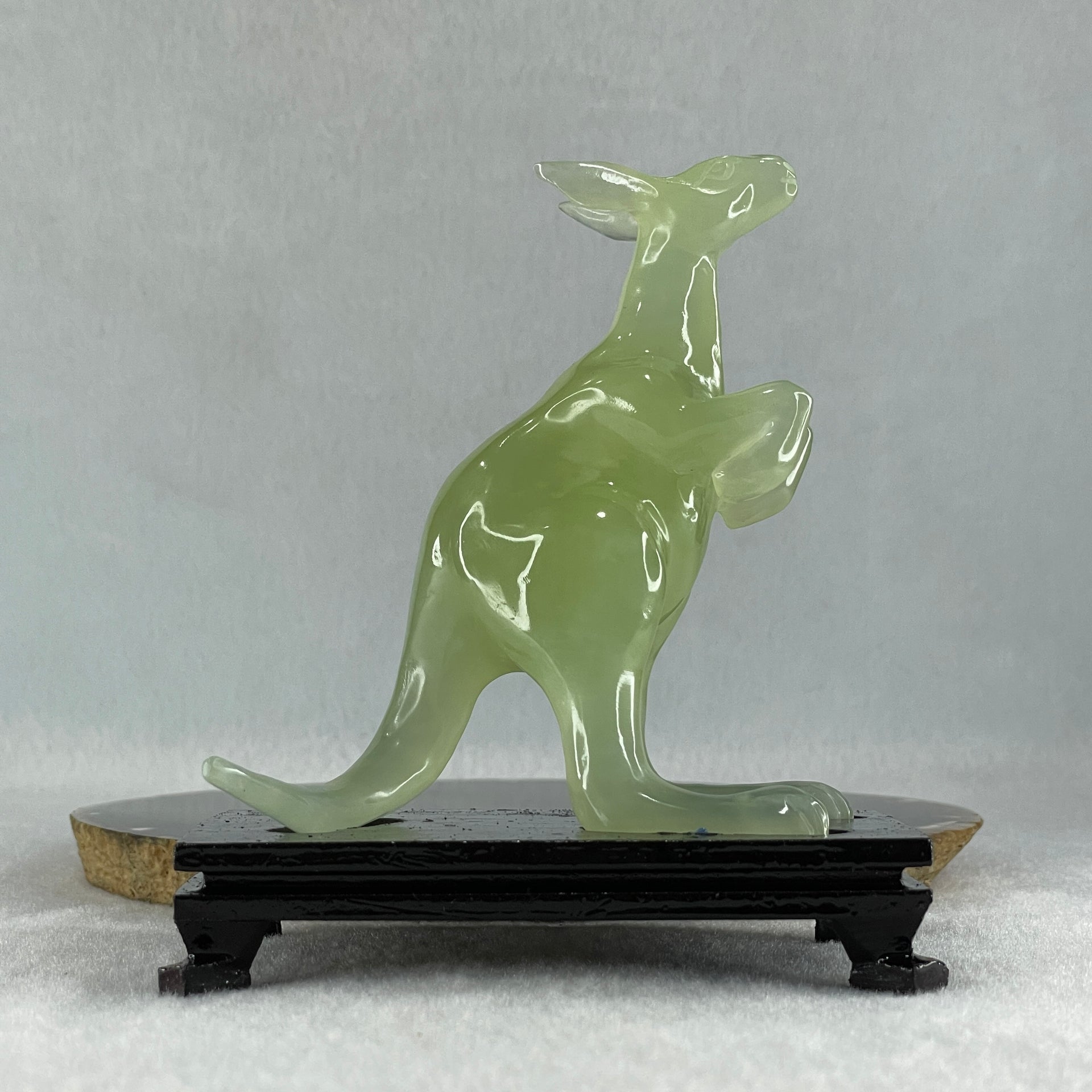Natural Green Serpentine Kangaroo with Wooden Stand Display 172.6g 100.8 by 63.0 by 115.0mm - Huangs Jadeite and Jewelry Pte Ltd