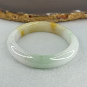 Type A Faint Lavender Green with Yellow Patches Jadeite Oval Bangle Internal Diameter 56.5mm  37.8696g 11.1 by 7.3mm (Very Slight Internal Line) - Huangs Jadeite and Jewelry Pte Ltd
