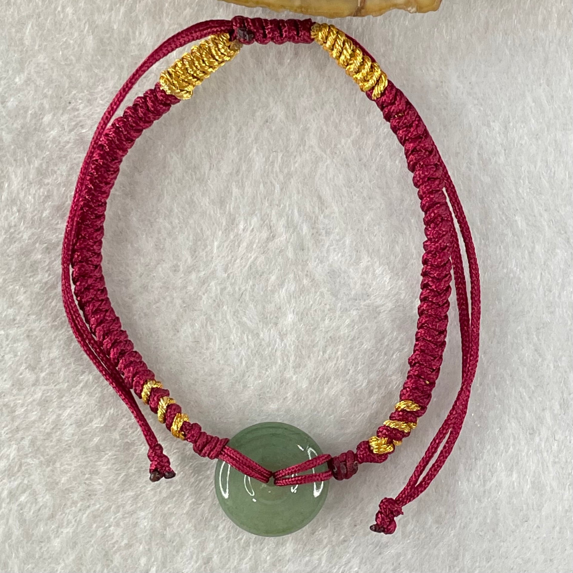 Type A Blueish Green Jadeite Ping An Kou Donut In String Bracelet 1.90g 12.5 by 3.8mm - Huangs Jadeite and Jewelry Pte Ltd