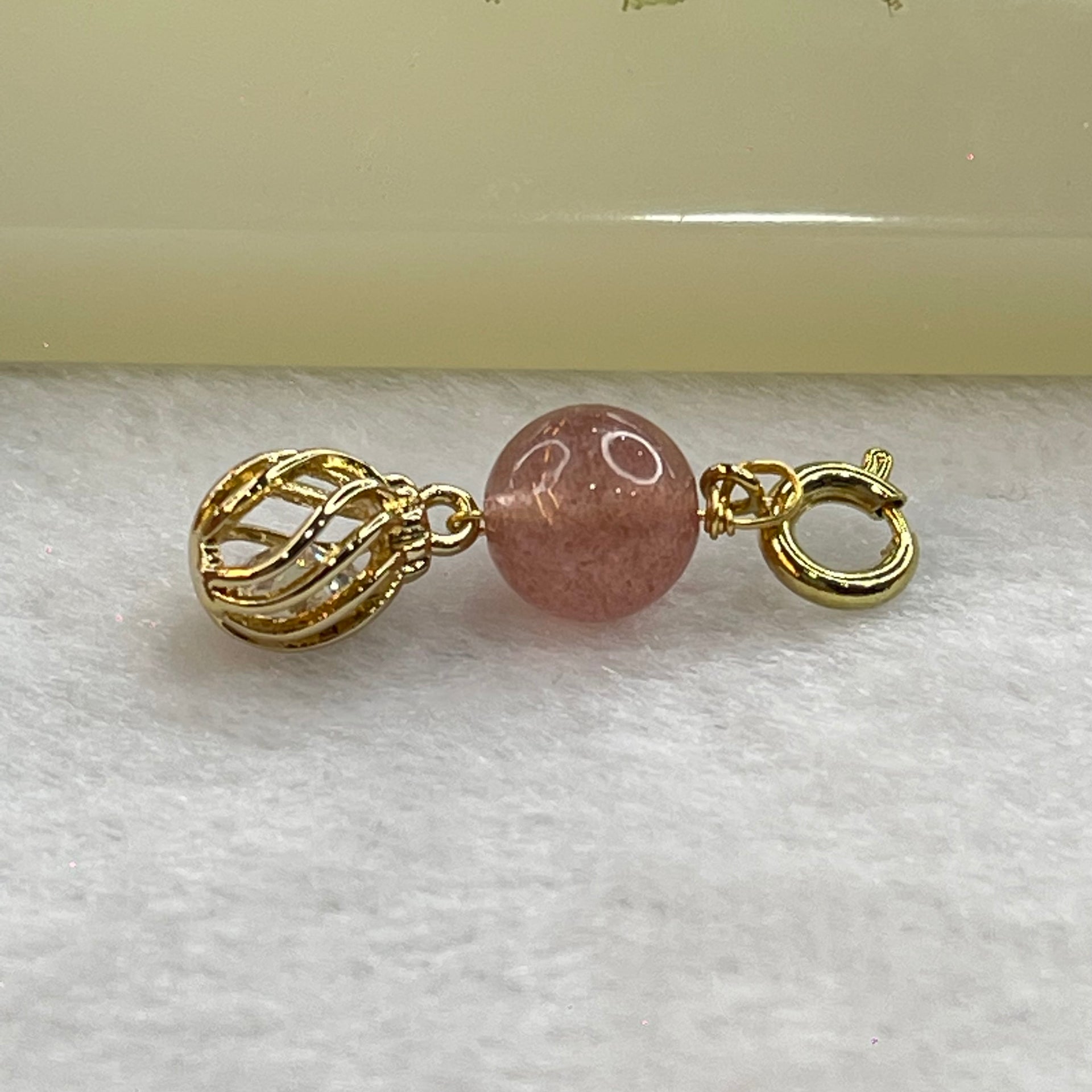Natural Strawberry Quartz and Crystal in Gold Colour Claps Pendent Charm 1.53g 7.9mm - Huangs Jadeite and Jewelry Pte Ltd