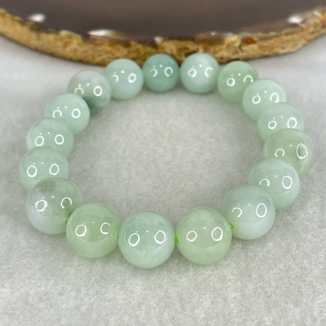 Type A Light Green and Blueish Green Patch Jadeite Beads Bracelet 44.03g 16.5cm by 12.0mm 17 Beads - Huangs Jadeite and Jewelry Pte Ltd