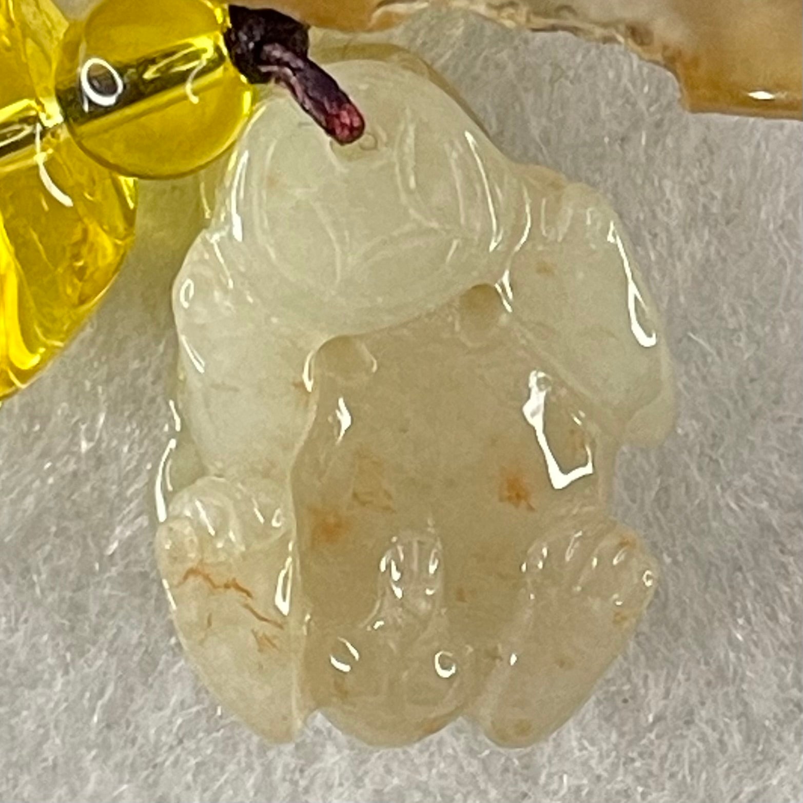 Type A Faint Yellow with Reddish Brown Spots Jadeite Male Pixiu Charm 8.27g 22.5 by 16 by 12.2mm - Huangs Jadeite and Jewelry Pte Ltd