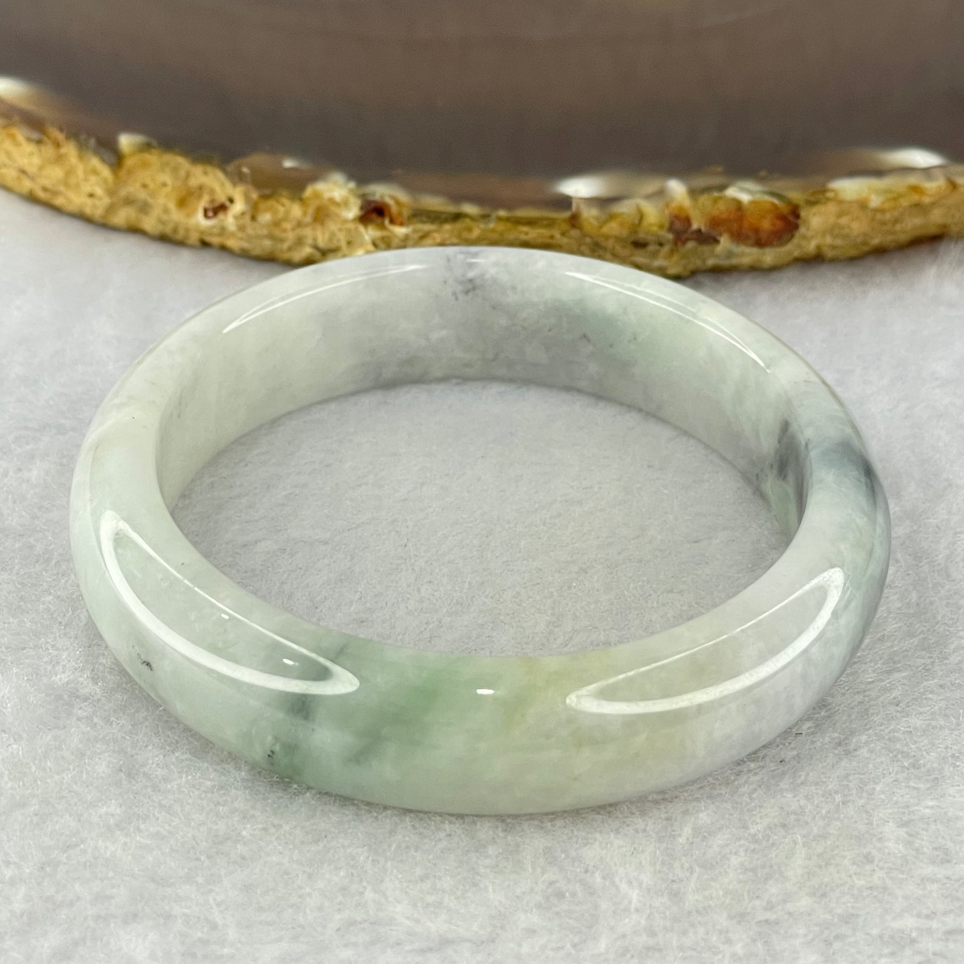 Type A Lavender Green with Grey Wuji Piao Hua Jadeite Oval Bangle Internal Diameter 56.0mm 44.31g 12.7 by 7.7mm (Slight Internal Lines) - Huangs Jadeite and Jewelry Pte Ltd