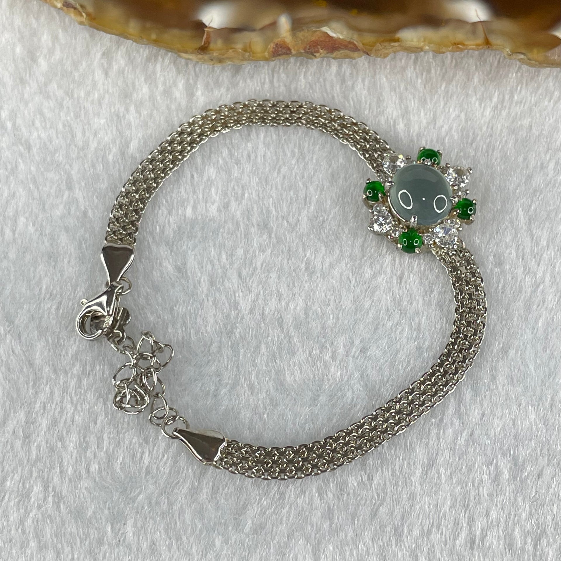 Type A Icy Blueish Green Jadeite Cabochon With Crystals in S925 Sliver Bracelet 5.02g 7.6 by 4.0mm - Huangs Jadeite and Jewelry Pte Ltd