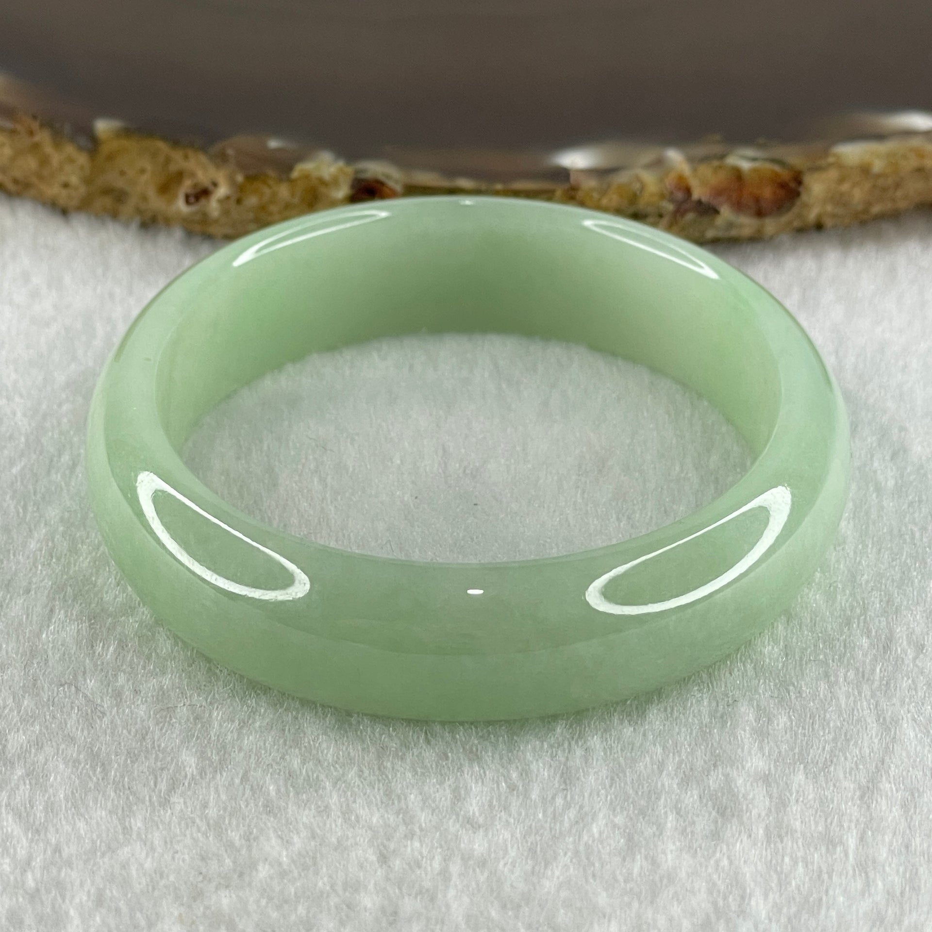 Type A Natural Light Apple Green Jadeite Oval Bangle 36.05g Inner Diameter 53.8mm 13.5 by 6.2mm (Close to Perfect) - Huangs Jadeite and Jewelry Pte Ltd