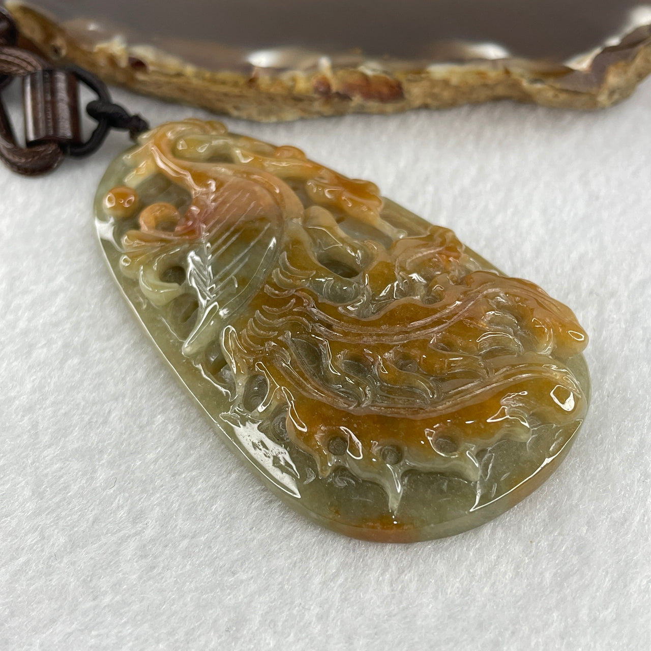 Natural Type A Brownish Yellow with Blueish Green Jadeite Phoenix Pendant 64.78g 75.2 by 42.7 by 11.6mm