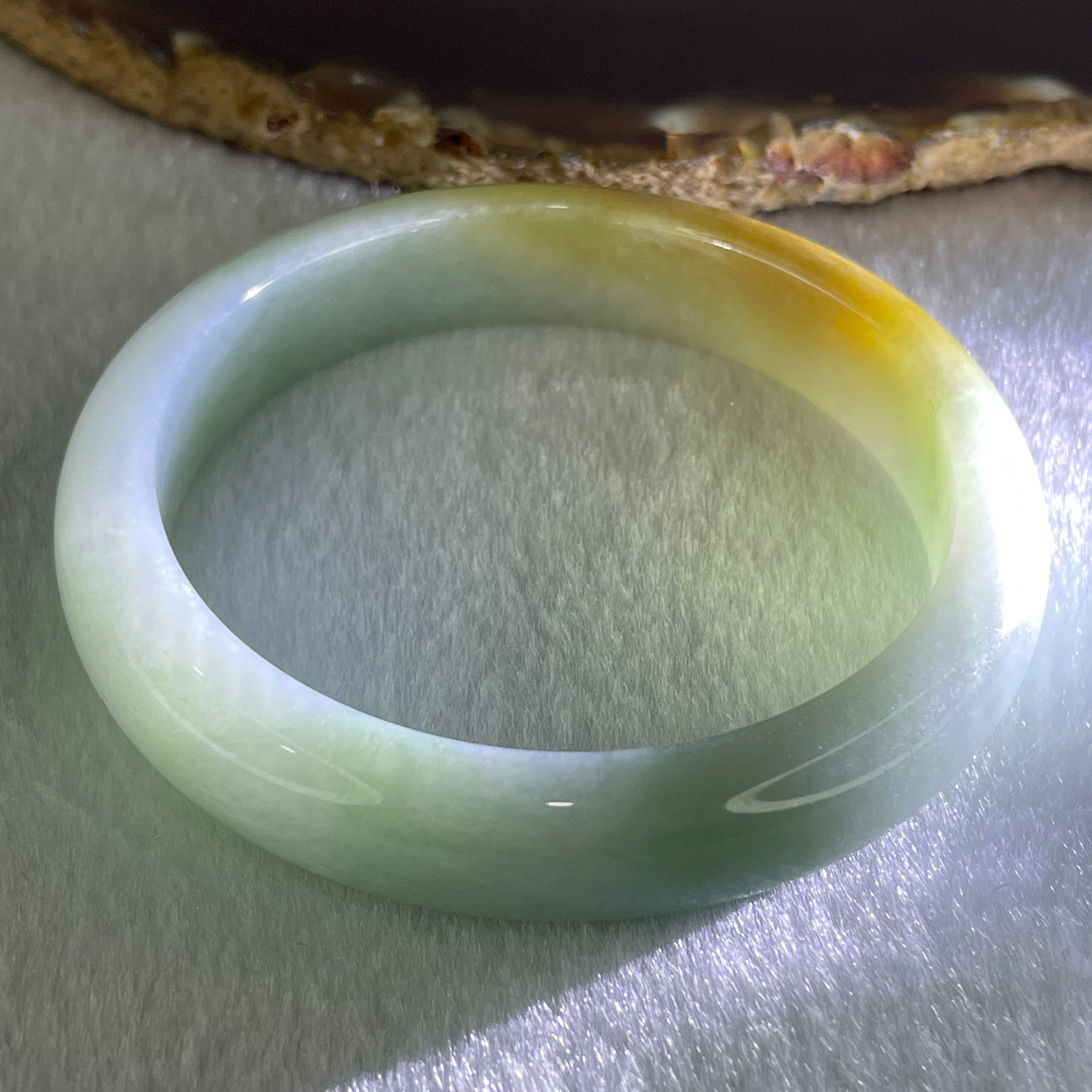 Type A Light Green with Yellow Piao Hua Jadeite Bangle 47.89g Internal Diameter 55.6mm 12.2 by 7.6mm (Slight Internal Lines) - Huangs Jadeite and Jewelry Pte Ltd