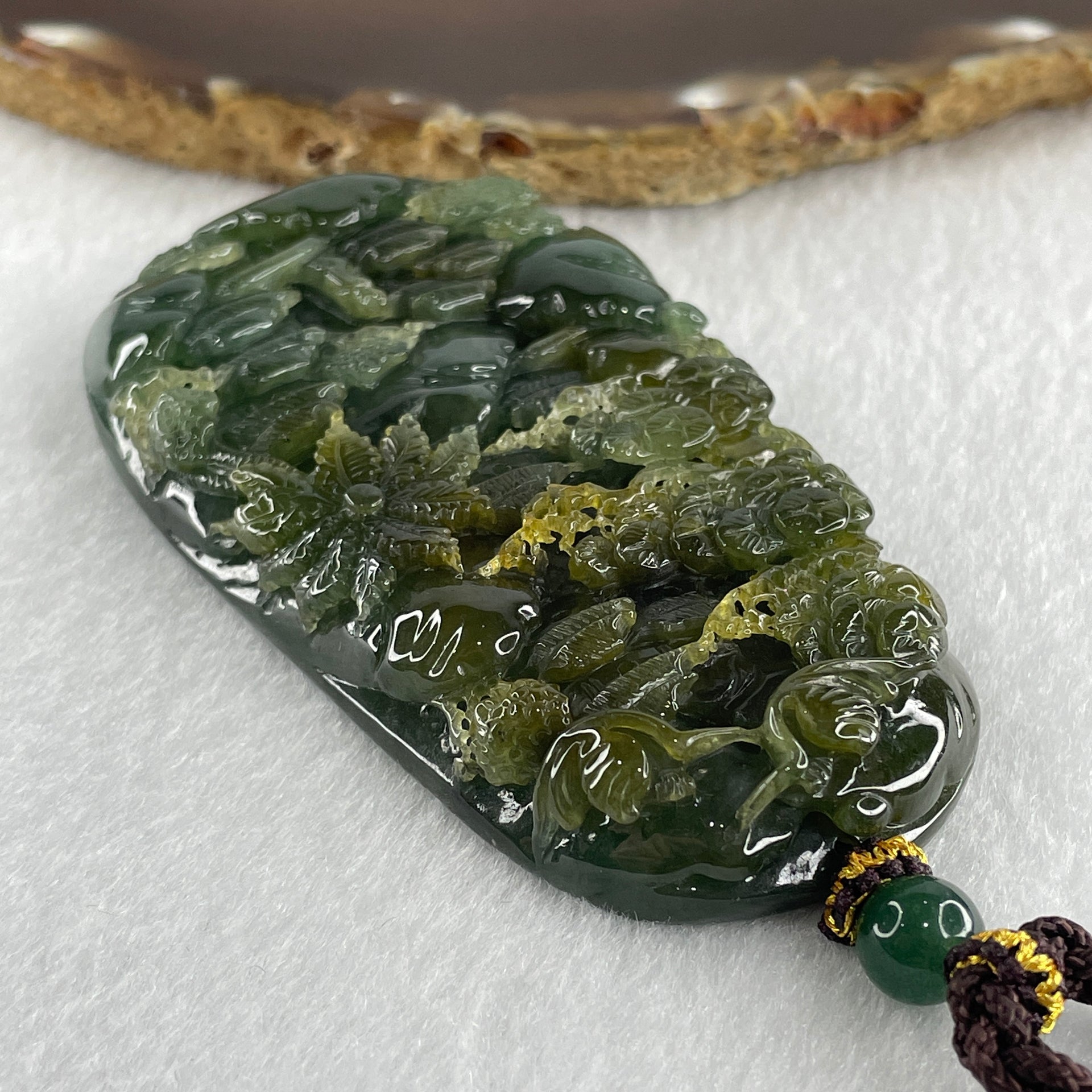 Grand Master Type Green with Brownish Yellow Jadeite Shan Shui with Gui Ren Pendant 112.63g 80.3 by 46.8 by 13.0mm - Huangs Jadeite and Jewelry Pte Ltd