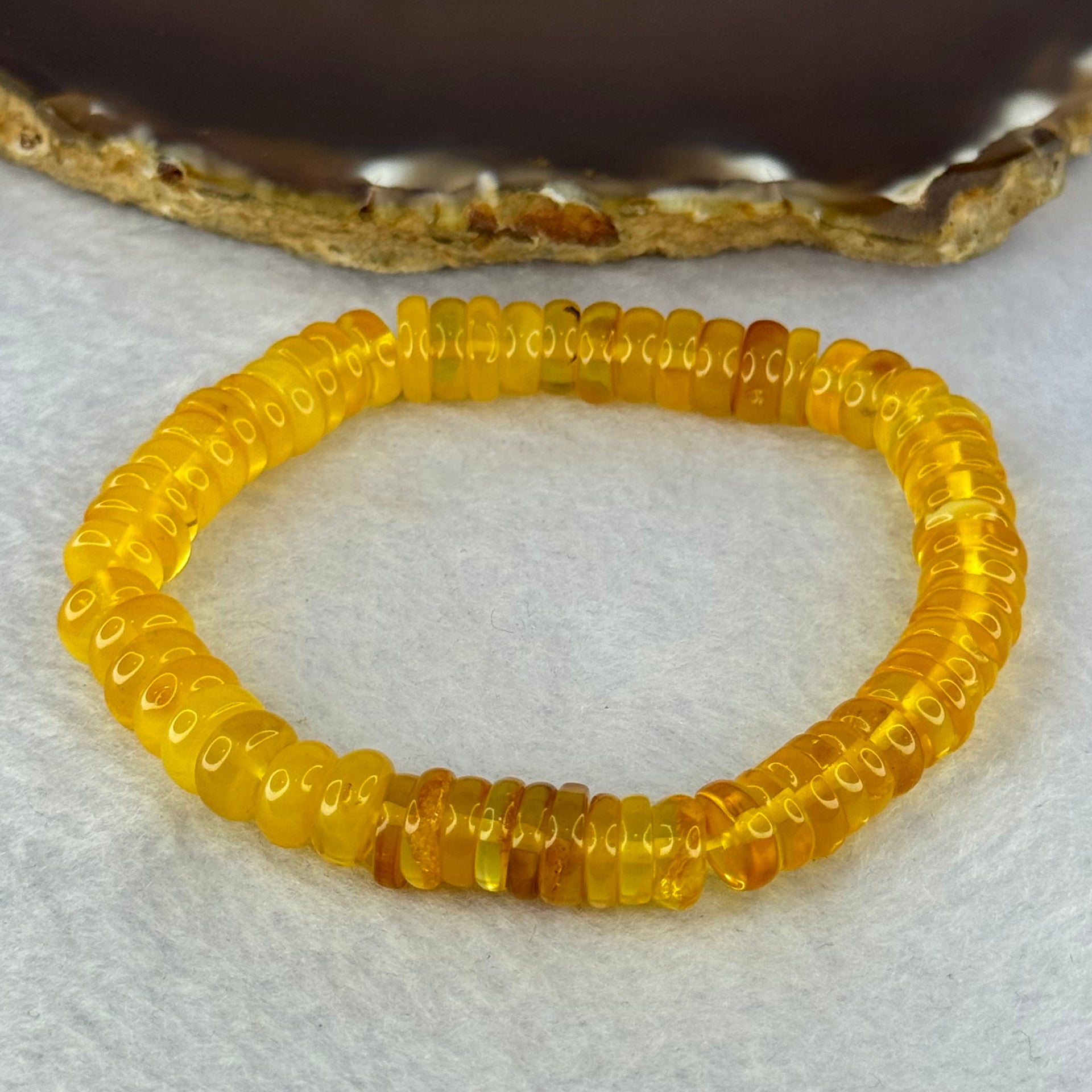 Natural Amber Ping An Kou Donut Shape Bracelet 天然琥珀手链 10.27g 16.5cm 9.2 by 3.3mm 70pcs - Huangs Jadeite and Jewelry Pte Ltd