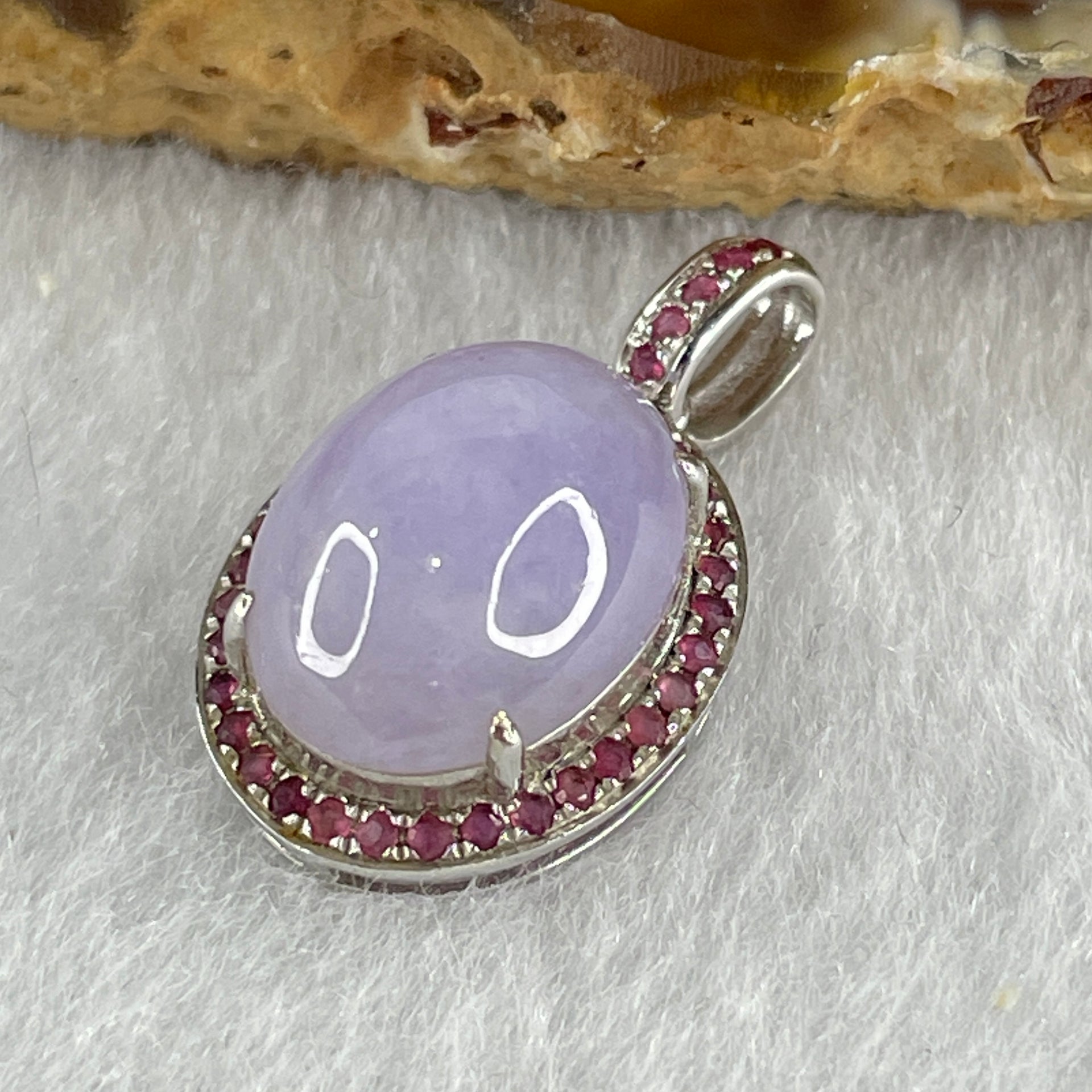 High Grade Natural Type A Bright Lavender Jadeite Cabouchon Oval Shape Pendant in 18K AU750 White Gold with Natural Pink Sapphires 2.97g 13.3 by 10.4 by 6.0mm - Huangs Jadeite and Jewelry Pte Ltd