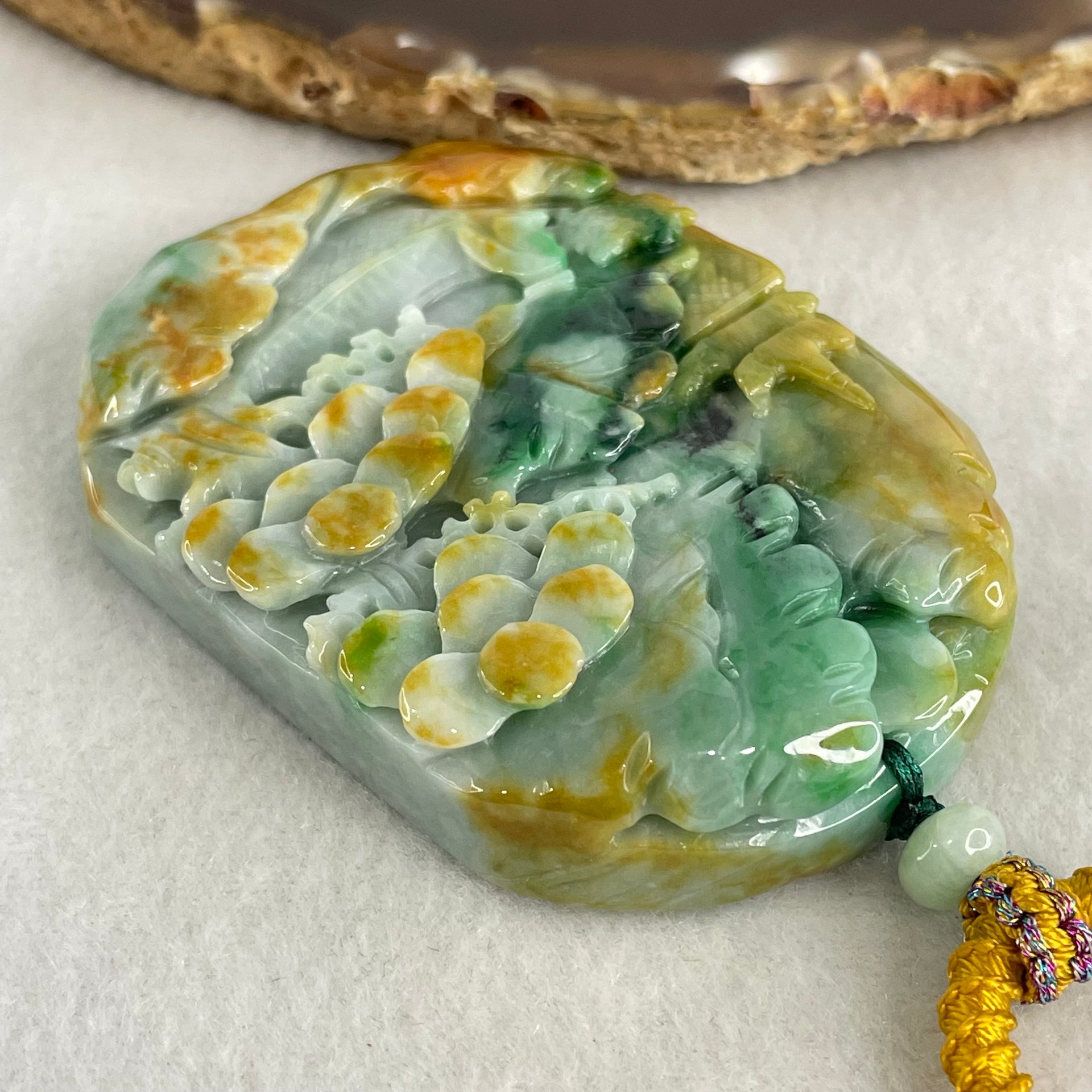 Type A Brown Blueish Green with Yellow Jadeite Shan Shui with Guiren Benefactor Pendant 93.95g 66.8 by 49.0 by 13.8mm - Huangs Jadeite and Jewelry Pte Ltd