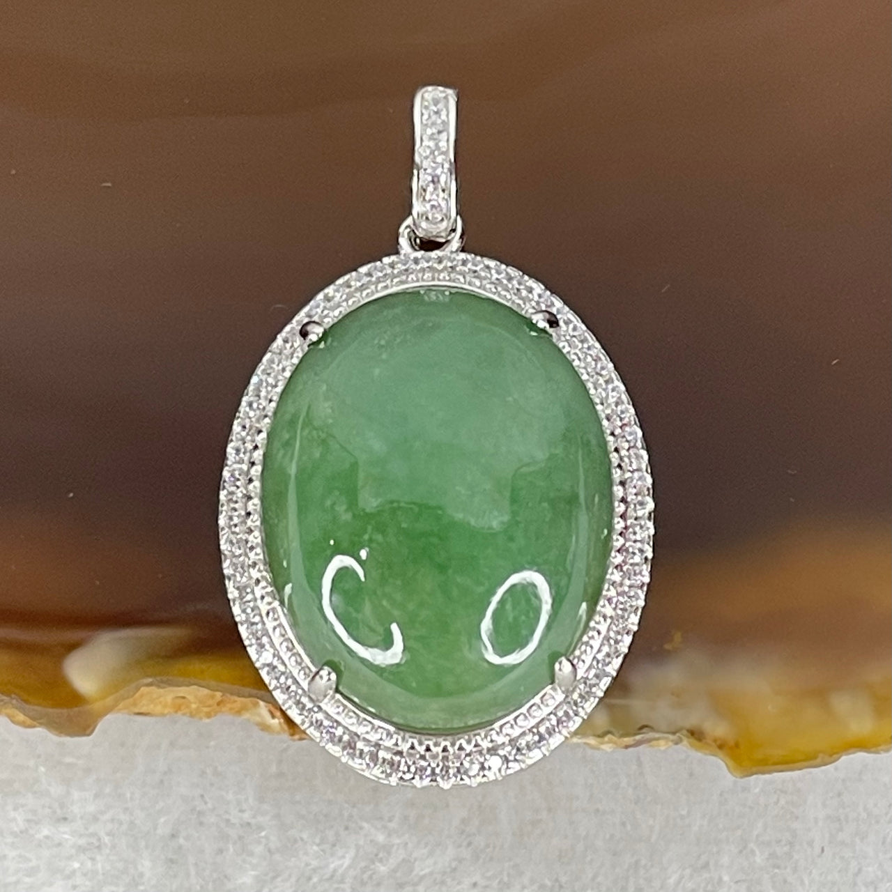 Type A Old Mine Spicy Green Cabochon Jadeite in S925 Sliver with Crystal Charm 6.60g 19.2 by 15.1 by 6.5mm - Huangs Jadeite and Jewelry Pte Ltd
