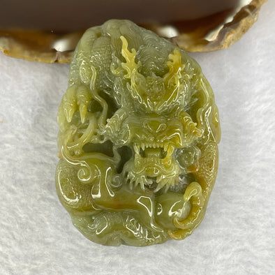 Type A Yellow Green Jadeite Dragon 91.14g 64.0 by 45.8 by 18.9mm - Huangs Jadeite and Jewelry Pte Ltd