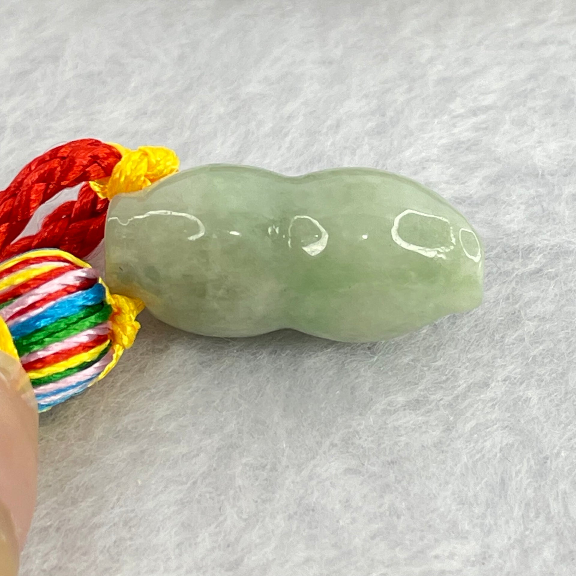 Type A Green Jadeite Peanut Charm Display 10.72g 24.4 by 11.5 by 11.3mm - Huangs Jadeite and Jewelry Pte Ltd