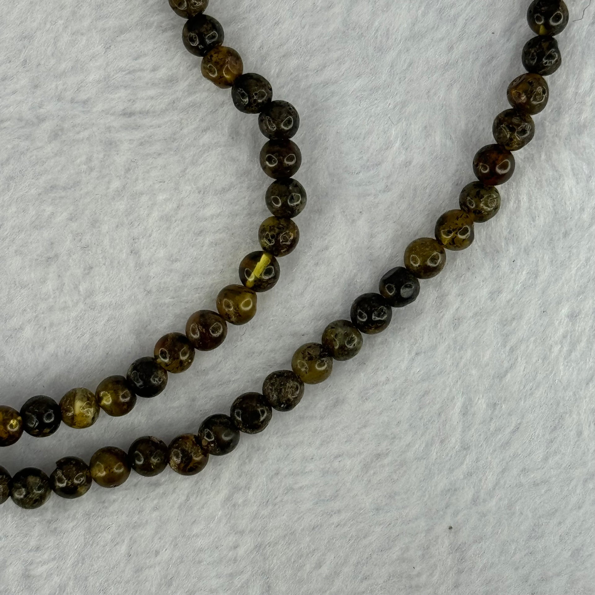 Natural Dark Brown Flower Amber Beads Elastic Necklace 8.02g 50cm 5.4mm 105 Beads - Huangs Jadeite and Jewelry Pte Ltd