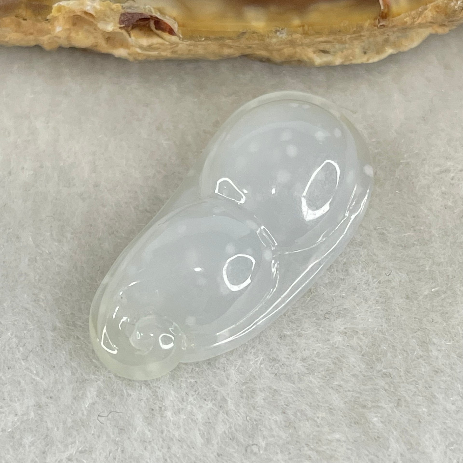 Type A Semi Icy Faint Green with Muna Jadeite Peapod Pendant 4.13g 28.0 by 13.2 by 7.4mm - Huangs Jadeite and Jewelry Pte Ltd