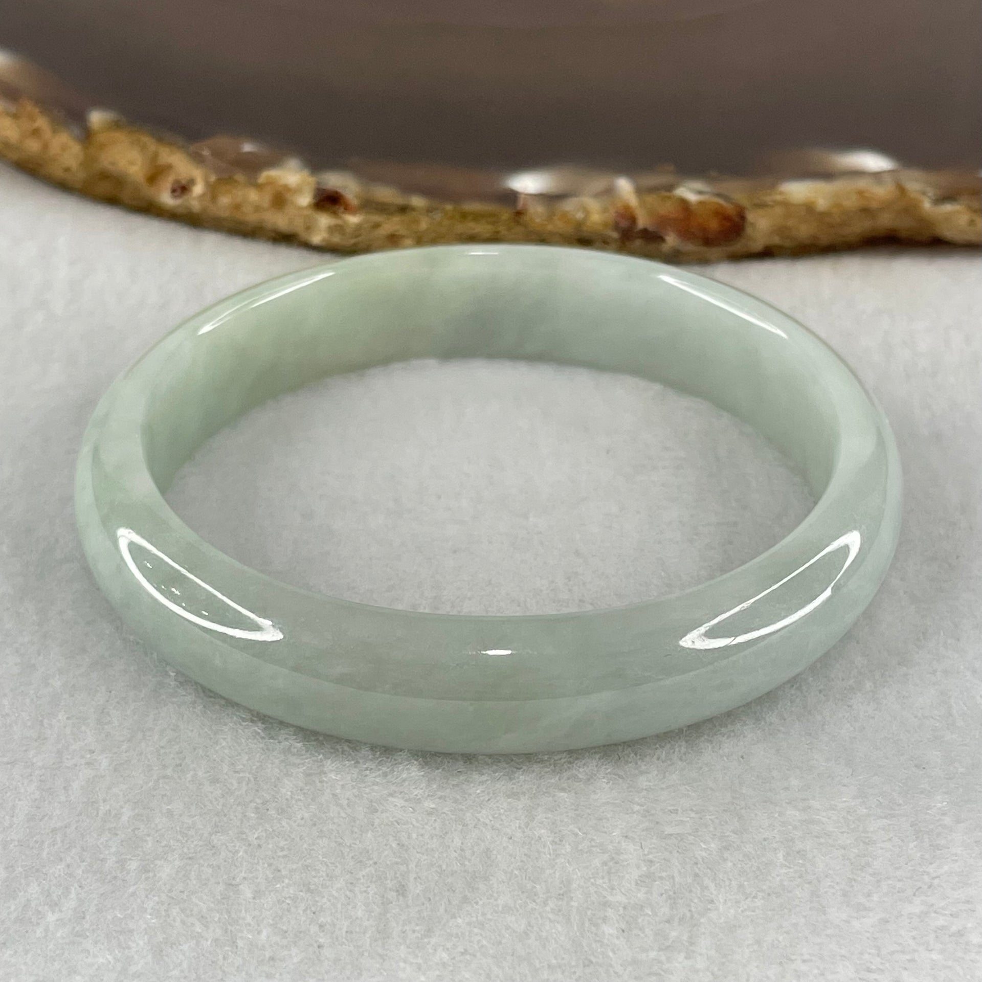 Type A Light Blueish Green Jadeite Oval Bangle 31.31g Internal Diameter 53.7mm 11.3 by 6.0mm (Internal Lines) - Huangs Jadeite and Jewelry Pte Ltd