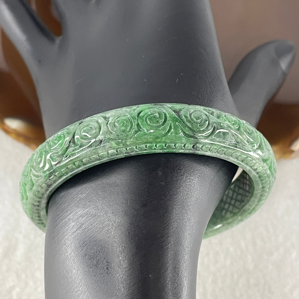 Natural Type Green Jadeite Prosperity Flowers Bangle 46.28g Inner Diameter 55.6mm 12.1 by 8.2mm (External Line) - Huangs Jadeite and Jewelry Pte Ltd