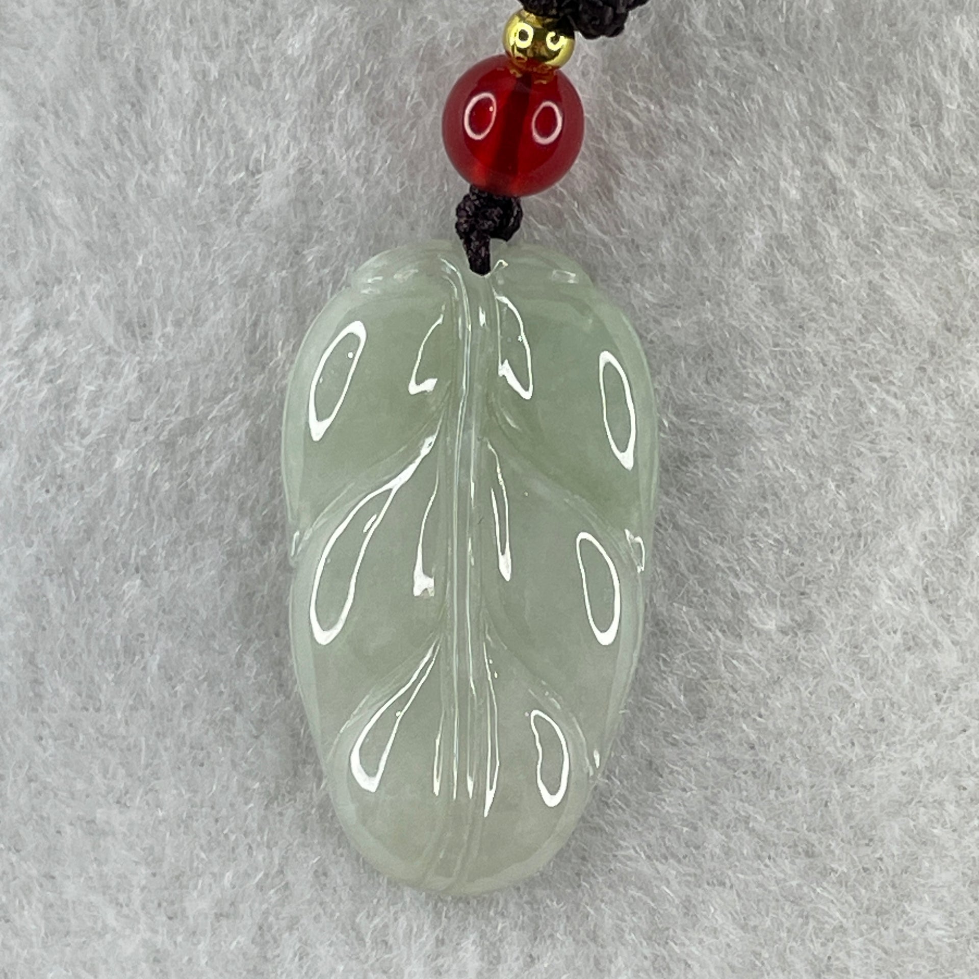 Natural Type A Faint Green Jadeite Leaf Pendant 4.77g 24.8 by 16.4 by 4.0mm - Huangs Jadeite and Jewelry Pte Ltd
