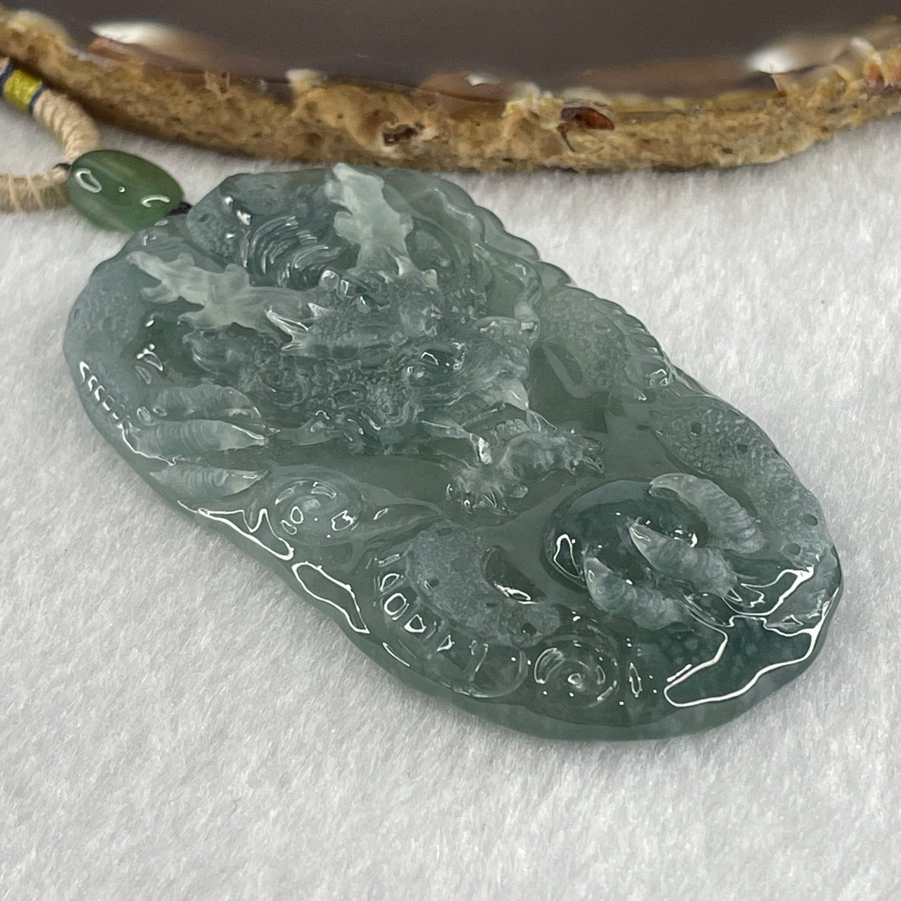 Type A Icy Blueish Green Jadeite Dragon Double Side Pendant 65.72g 73.0 by 41.9 by 9.8mm