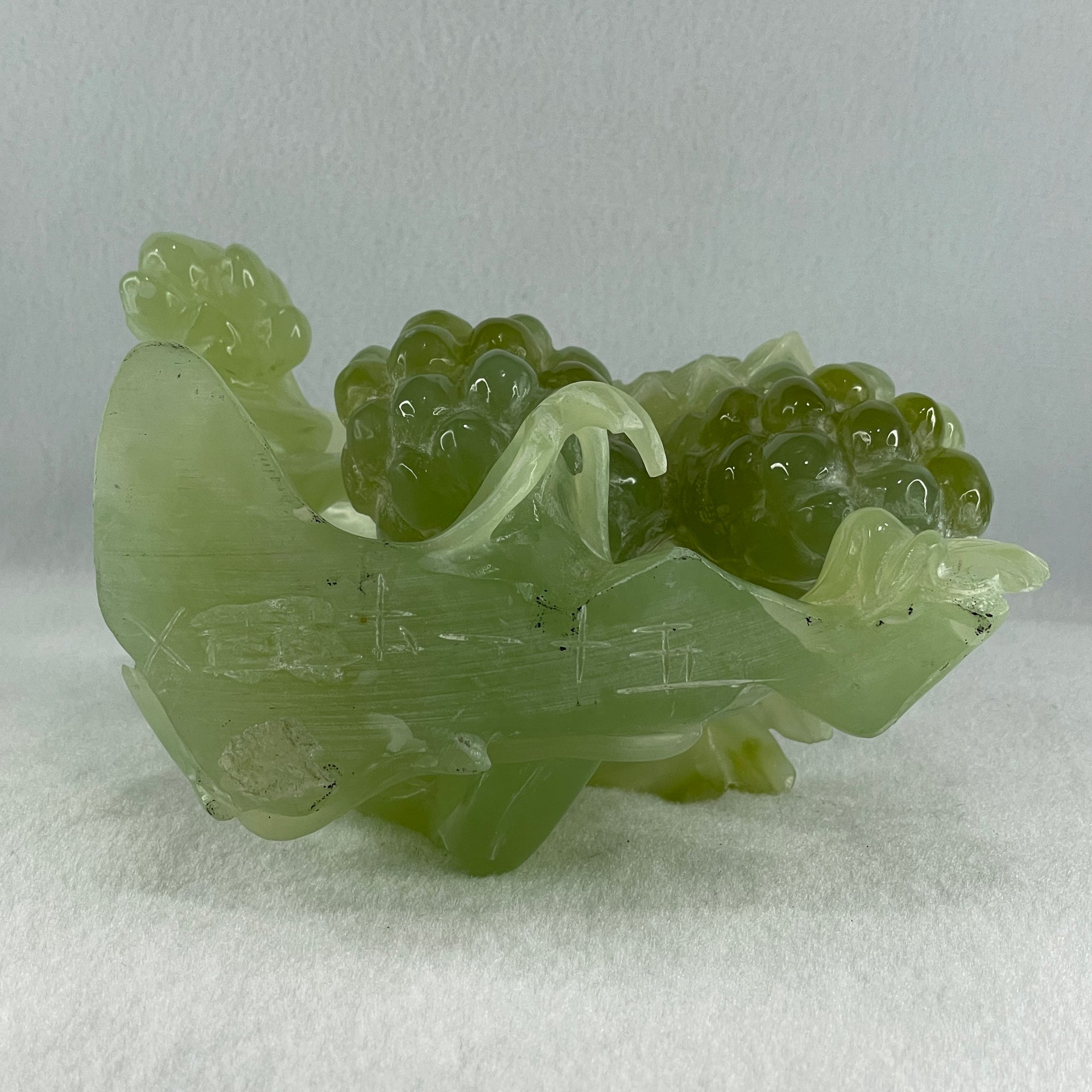 Natural Green Serpentine Magpie Bird with Cricket on Grape with Wooden Stand Display 1,042.7g L195.0 by B105.0 by H180.0 mm - Huangs Jadeite and Jewelry Pte Ltd