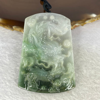 Type A Light Green and Dark Green with Light Lavender Jadeite Dragon Pendent 74.47g 67.9 by 48.2 by 11.5 mm - Huangs Jadeite and Jewelry Pte Ltd