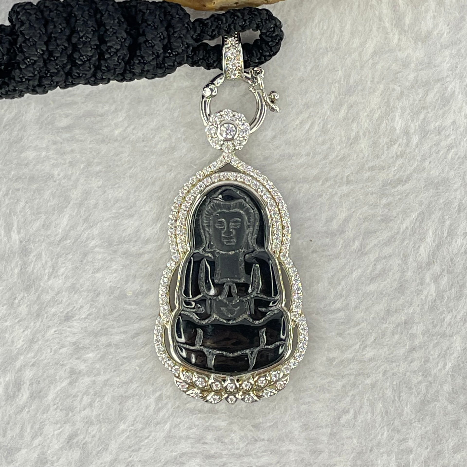 Type A Translucent Black Omphasite Jadeite Guan Yin 24.8 by 15.3 by 1.8mm Pendant in S925 Sliver Pendant 11.89g - Huangs Jadeite and Jewelry Pte Ltd