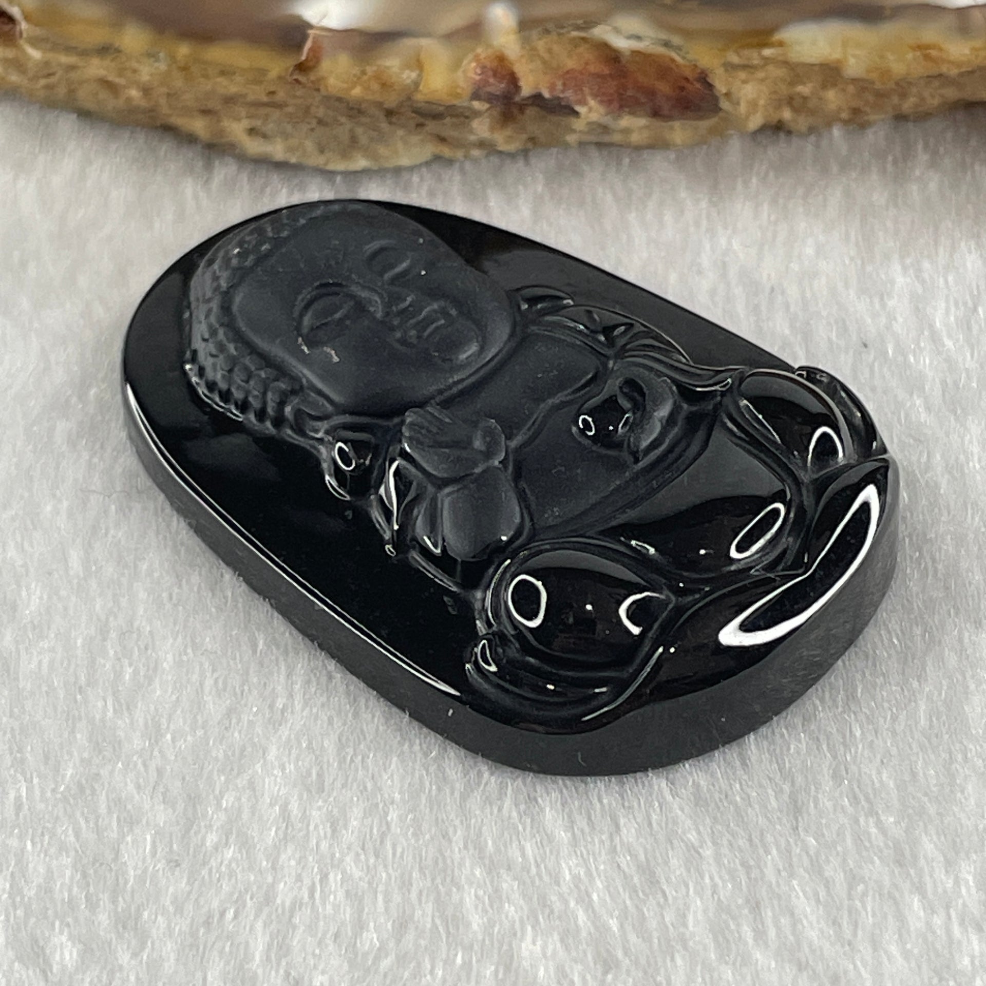 Type A Opaque to Partial Translucent Black Omphacite Jadeite Baby Buddha Pendant 13.75g 42.0 by 28.2 by 8.6mm - Huangs Jadeite and Jewelry Pte Ltd
